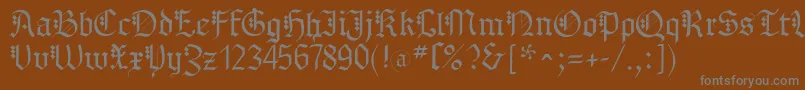 フォントMKBrokenTypes – 茶色の背景に灰色の文字