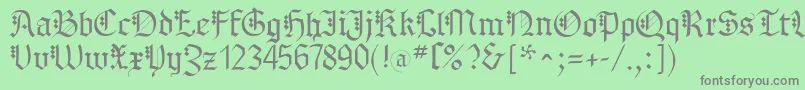 フォントMKBrokenTypes – 緑の背景に灰色の文字