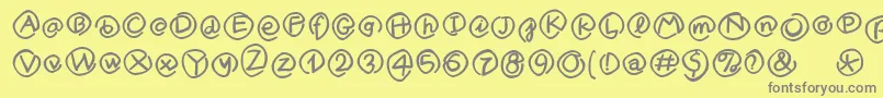MKlammerAffen-Schriftart – Graue Schriften auf gelbem Hintergrund