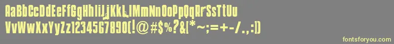 Mobsters Font – Yellow Fonts on Gray Background