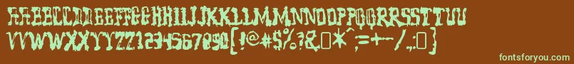 フォントmodel worker – 緑色の文字が茶色の背景にあります。
