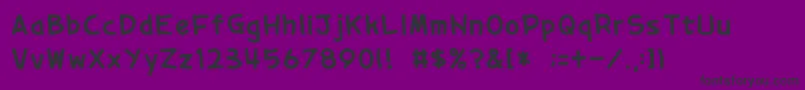 01tama Font – Black Fonts on Purple Background