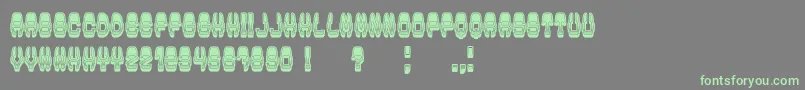 フォントModishGradient – 灰色の背景に緑のフォント