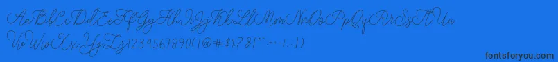 Fonte modista script – fontes pretas em um fundo azul