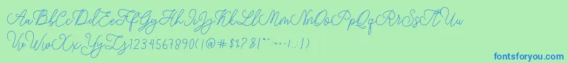 フォントmodista script – 青い文字は緑の背景です。