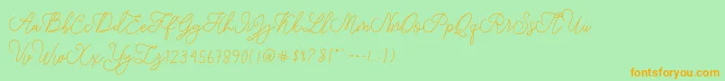 modista script-Schriftart – Orangefarbene Schriften auf grünem Hintergrund