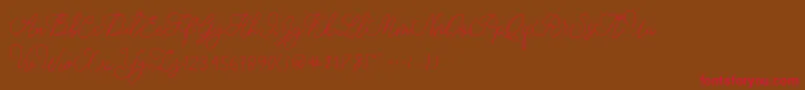Fonte modista script – fontes vermelhas em um fundo marrom