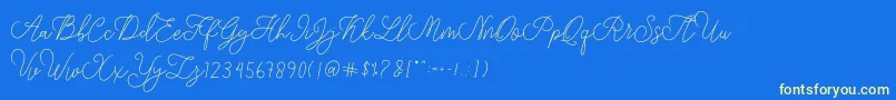 フォントmodista script – 黄色の文字、青い背景