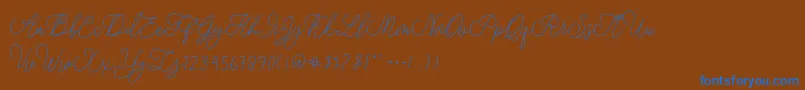 modista script-Schriftart – Blaue Schriften auf braunem Hintergrund