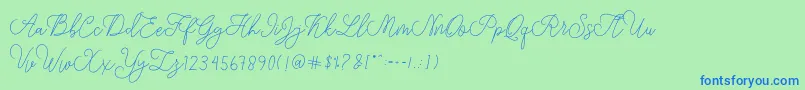 modista script-Schriftart – Blaue Schriften auf grünem Hintergrund