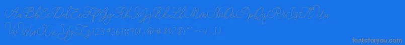 modista script-Schriftart – Graue Schriften auf blauem Hintergrund