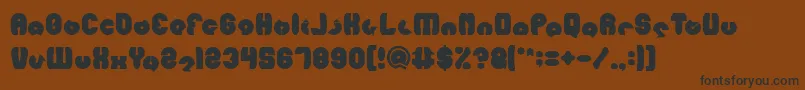 MOHR Bold-fontti – mustat fontit ruskealla taustalla