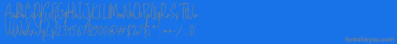 Mojang Script-Schriftart – Graue Schriften auf blauem Hintergrund