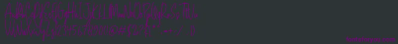 Czcionka Mojang Script – fioletowe czcionki na czarnym tle
