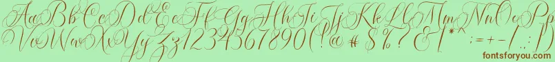 fuente Molandika Script – Fuentes Marrones Sobre Fondo Verde