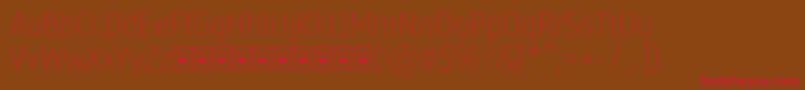 Fonte Molecula Demo Thin – fontes vermelhas em um fundo marrom