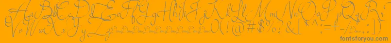 Mollucash DEMO-Schriftart – Graue Schriften auf orangefarbenem Hintergrund