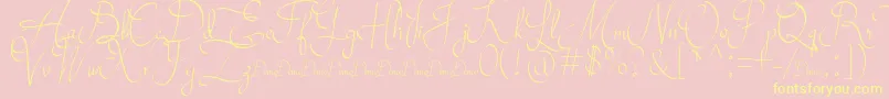 Mollucash DEMO-Schriftart – Gelbe Schriften auf rosa Hintergrund