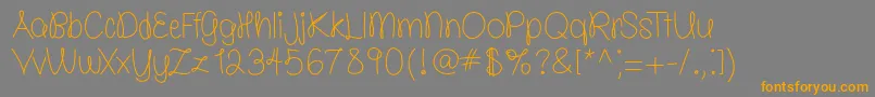 molly is the best   free   TFF-Schriftart – Orangefarbene Schriften auf grauem Hintergrund