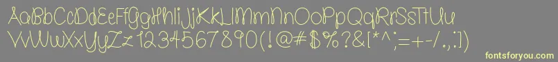 Шрифт molly is the best   free   TFF – жёлтые шрифты на сером фоне