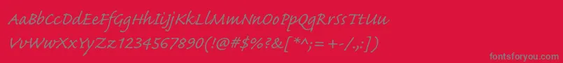 Czcionka CaflischscriptproRegular – szare czcionki na czerwonym tle