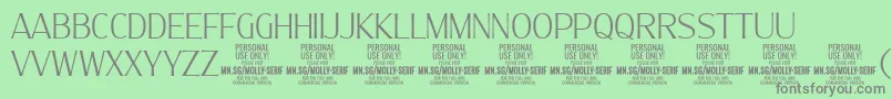 MollySerifC Th PERSONAL-Schriftart – Graue Schriften auf grünem Hintergrund