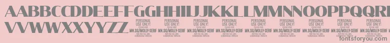 フォントMollySerifN Bl PERSONAL – ピンクの背景に灰色の文字