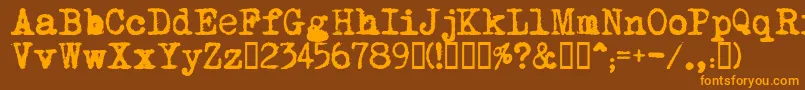 フォントMomРѕt    – オレンジ色の文字が茶色の背景にあります。