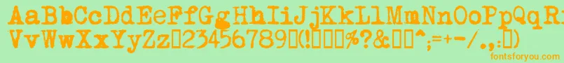 フォントMomРѕt    – オレンジの文字が緑の背景にあります。