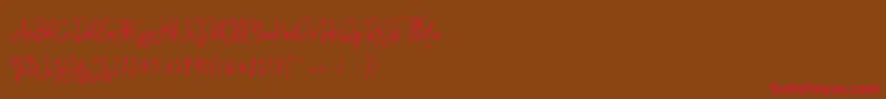 Monalisa Monoline Script-Schriftart – Rote Schriften auf braunem Hintergrund
