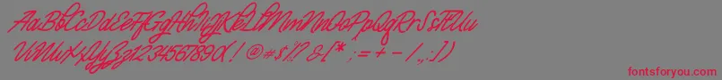 フォントMonalisa Script Demo – 赤い文字の灰色の背景