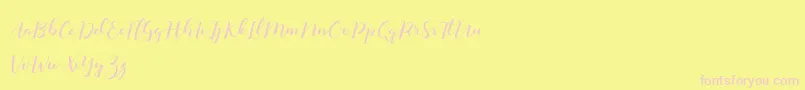 Monatia Demo-Schriftart – Rosa Schriften auf gelbem Hintergrund