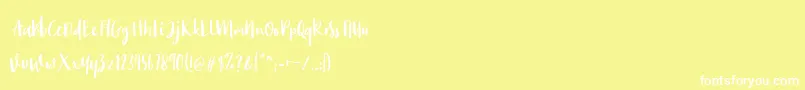 Fonte Monday Bay – fontes brancas em um fundo amarelo