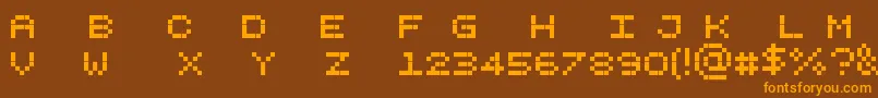 Pixelicious-fontti – oranssit fontit ruskealla taustalla