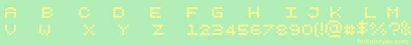 Pixelicious Font – Yellow Fonts on Green Background