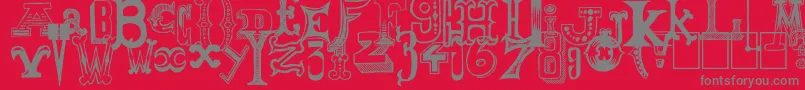 フォントMoneyGoRound – 赤い背景に灰色の文字