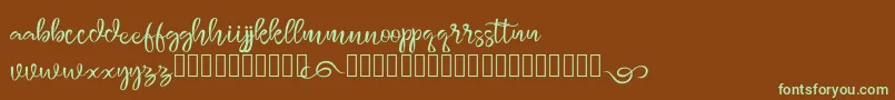 monggolah Font – Green Fonts on Brown Background