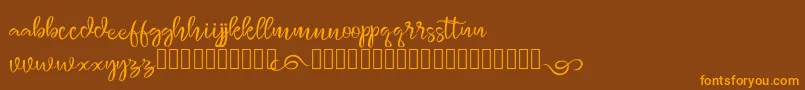 monggolah Font – Orange Fonts on Brown Background