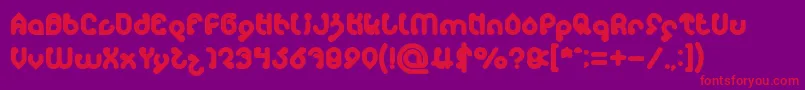 Czcionka monica Bold – czerwone czcionki na fioletowym tle