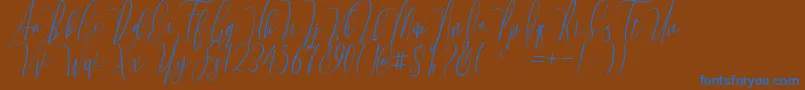 Monica Free Font – Blue Fonts on Brown Background