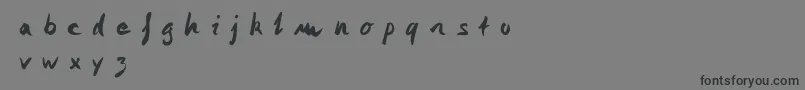 フォントMonika Monika – 黒い文字の灰色の背景