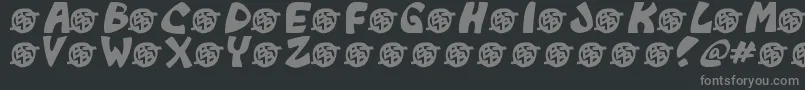 Fonte Monkeyboy – fontes cinzas em um fundo preto