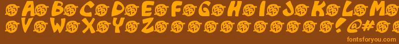 Czcionka Monkeyboy – pomarańczowe czcionki na brązowym tle