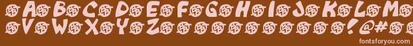 Czcionka Monkeyboy – różowe czcionki na brązowym tle