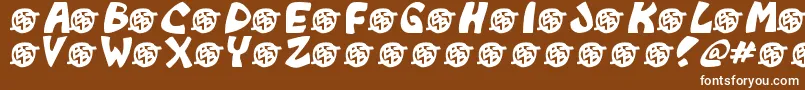 Fonte Monkeyboy – fontes brancas em um fundo marrom