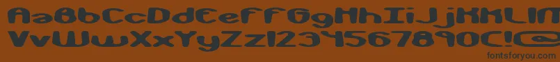 monkphon Font – Black Fonts on Brown Background