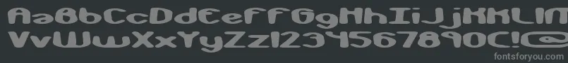 monkphon-fontti – harmaat kirjasimet mustalla taustalla