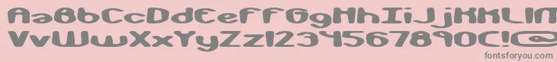 monkphon-fontti – harmaat kirjasimet vaaleanpunaisella taustalla