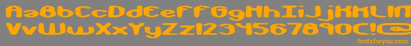 フォントmonkphon – オレンジの文字は灰色の背景にあります。