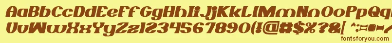 Fonte MONOCHROME Bold Italic – fontes marrons em um fundo amarelo